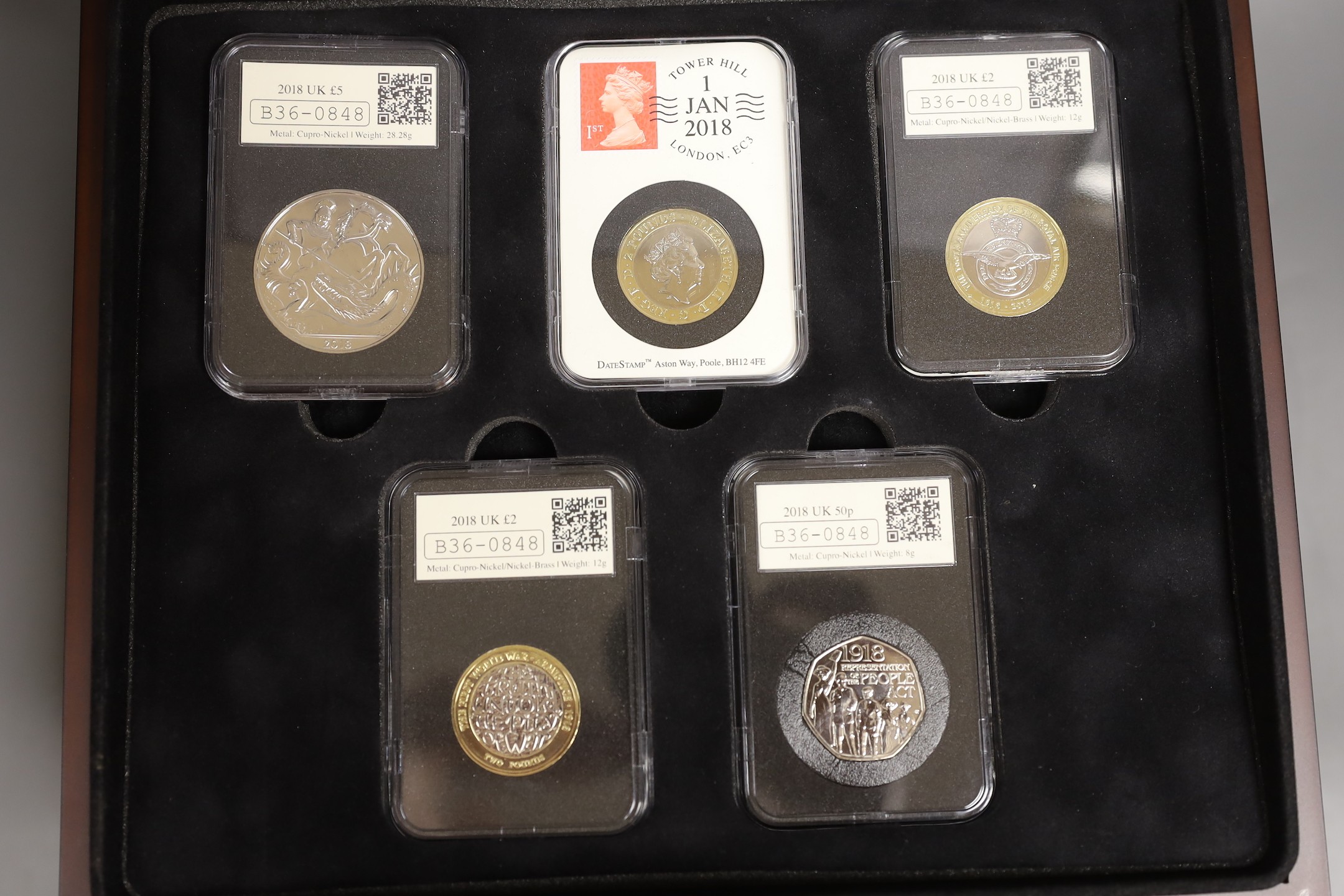 UK uncirculated commemorative 50p, £1, £2 and £5 coins, issued by DateStamp and coin portfolio management, cased or packaged